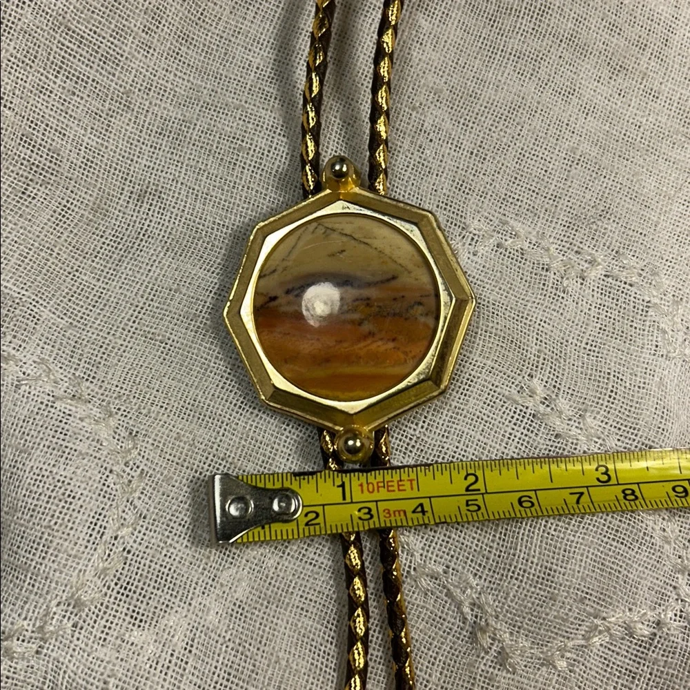 Vintage Bolo tie western leather, with ornate medallion, space for silver dollar